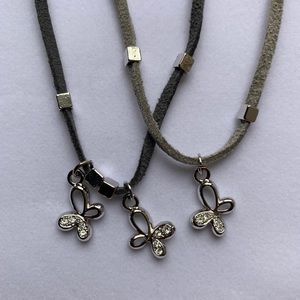 Choker necklace / Gray suede with silver accents.